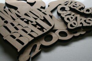 Thick laser cut wood in walnut for commercial sale