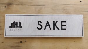 Store sign laser etched / burned into maple